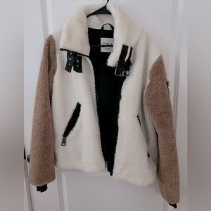 Only worn a couple of times. No need for it, I have another winter jacket.